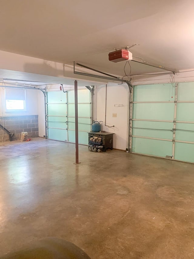 209 Raintree Rd, Verona, VA 24482 - garage with a garage door opener and concrete block wall