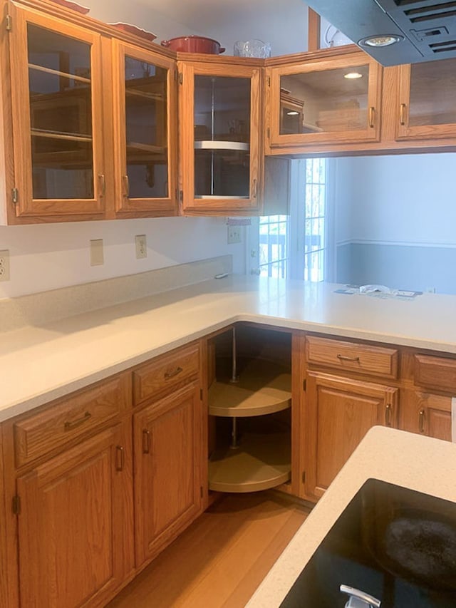 209 Raintree Rd, Verona, VA 24482 - kitchen with light countertops, range hood, and built in desk