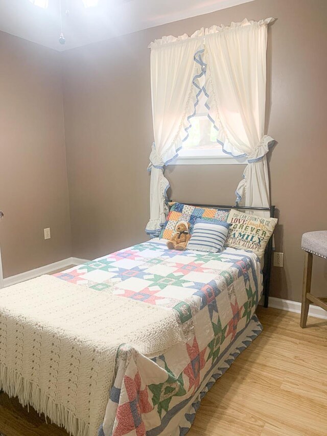 209 Raintree Rd, Verona, VA 24482 - bedroom with wood finished floors and baseboards
