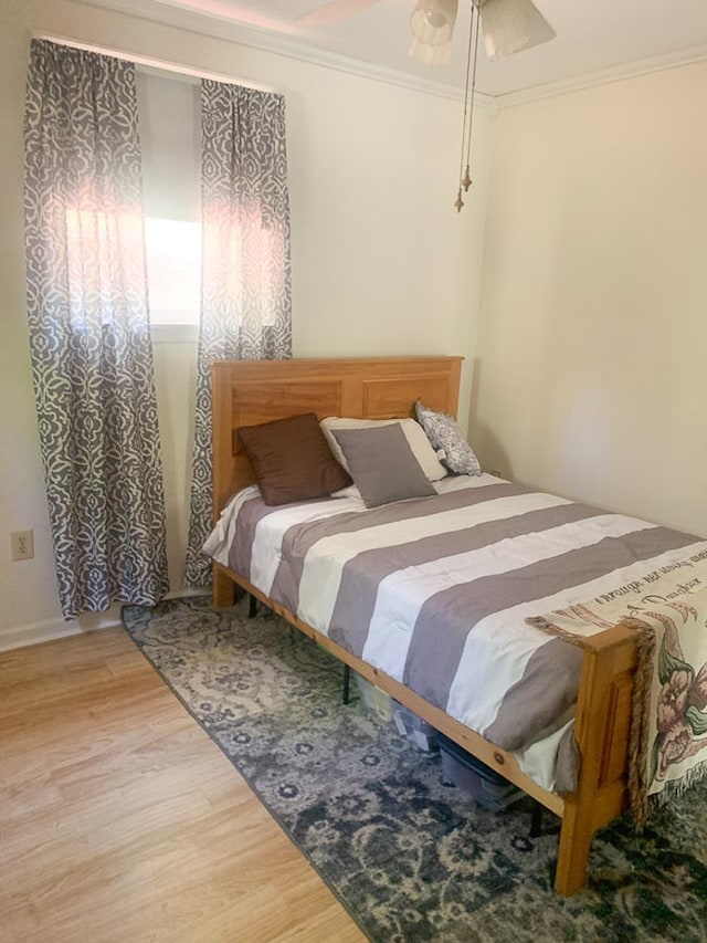 209 Raintree Rd, Verona, VA 24482 - bedroom with wood finished floors, crown molding, and ceiling fan