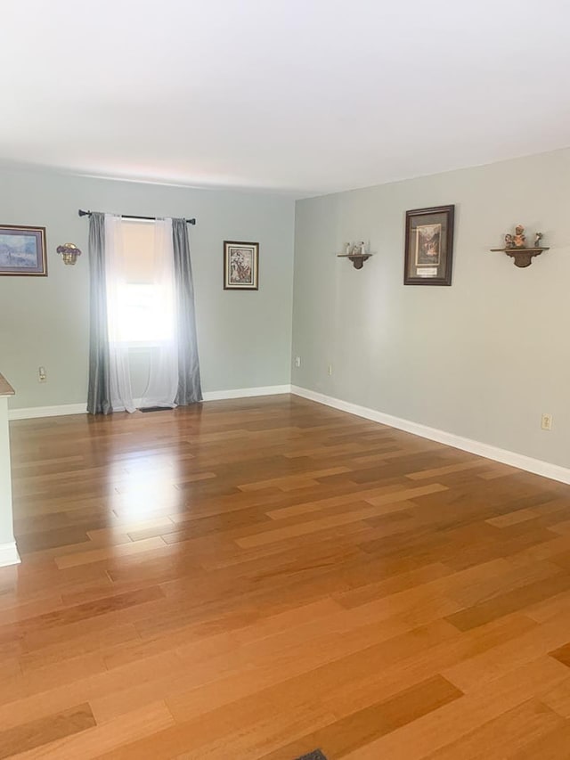 209 Raintree Rd, Verona, VA 24482 - spare room featuring light wood-type flooring and baseboards