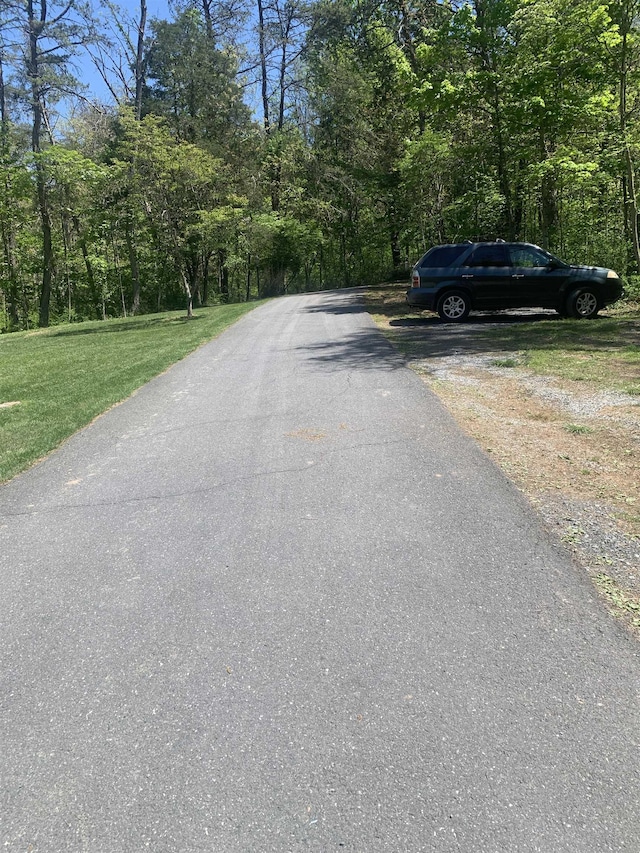 209 Raintree Rd, Verona, VA 24482 - view of asphalt road featuring a wooded view