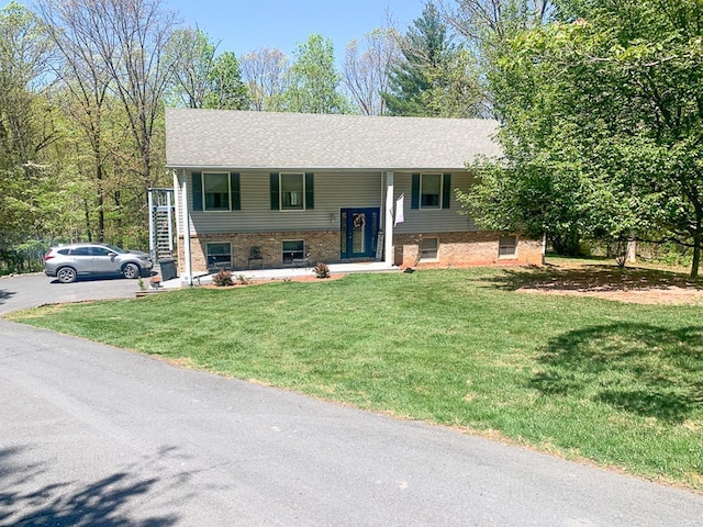 209 Raintree Rd, Verona, VA 24482 - split foyer home featuring a front lawn, brick siding, and a porch