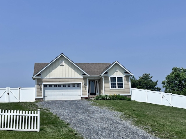 70 Spring Ridge Ln, Fairfield, VA 24435 - view of front of home featuring a gate, a garage, board and batten siding, and gravel driveway