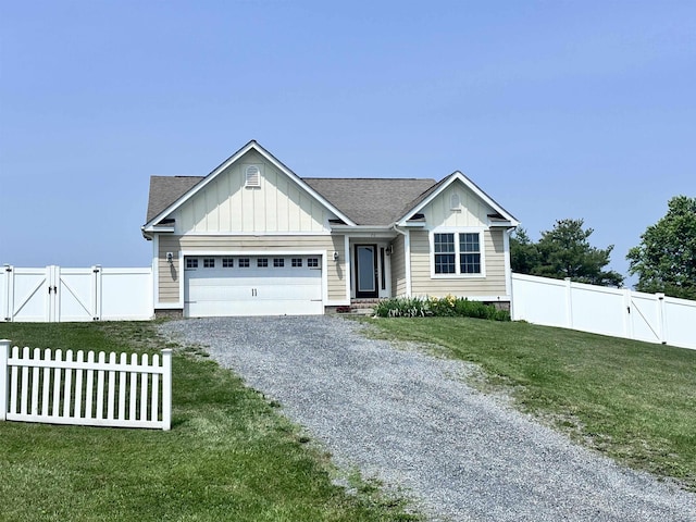 70 Spring Ridge Ln, Fairfield, VA 24435 - view of front of house featuring a gate, board and batten siding, gravel driveway, and a garage