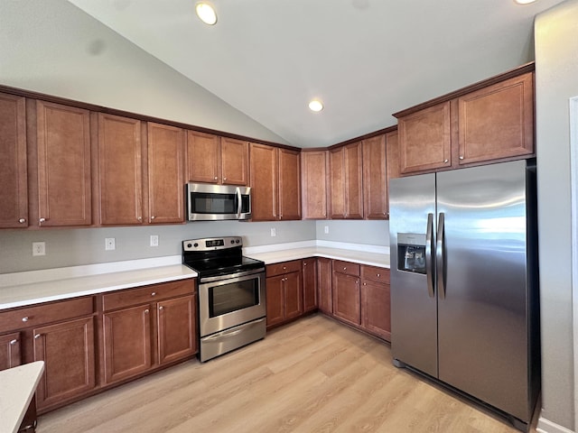 70 Spring Ridge Ln, Fairfield, VA 24435 - kitchen featuring stainless steel appliances, vaulted ceiling, light wood-type flooring, light countertops, and recessed lighting