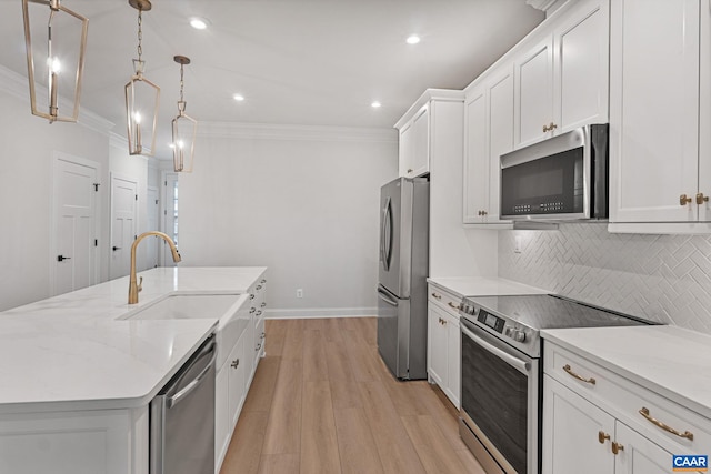1367 Laconia Ln, Charlottesville, VA 22911 - kitchen with stainless steel appliances, crown molding, white cabinets, tasteful backsplash, and a kitchen island with sink