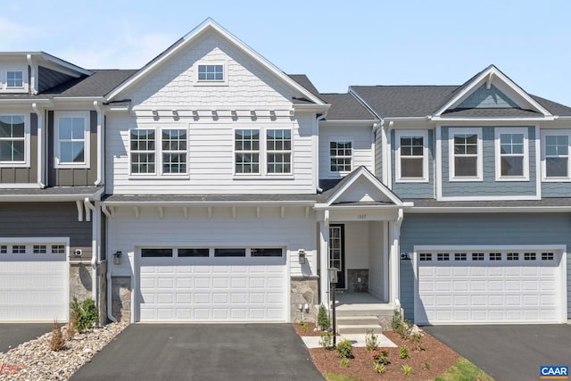 1367 Laconia Ln, Charlottesville, VA 22911 - view of property with a garage, asphalt driveway, and stone siding