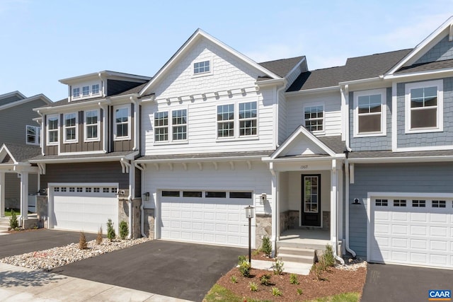 1367 Laconia Ln, Charlottesville, VA 22911 - view of property with a garage, driveway, and stone siding