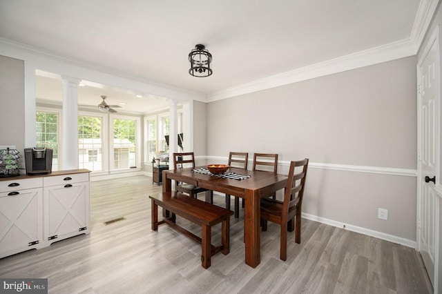 11603 Enchanted Woods Way, Fredericksburg, VA 22407 - dining space featuring decorative columns, light wood-type flooring, ornamental molding, and baseboards