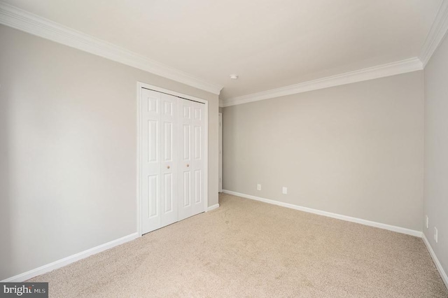 11603 Enchanted Woods Way, Fredericksburg, VA 22407 - unfurnished bedroom featuring ornamental molding, carpet, a closet, and baseboards