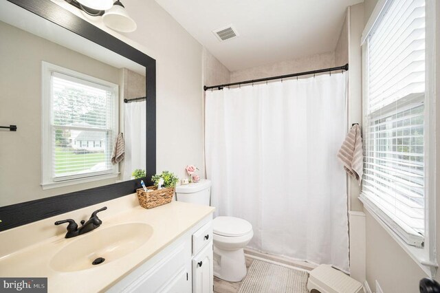 11603 Enchanted Woods Way, Fredericksburg, VA 22407 - bathroom featuring toilet, vanity, and a shower with shower curtain