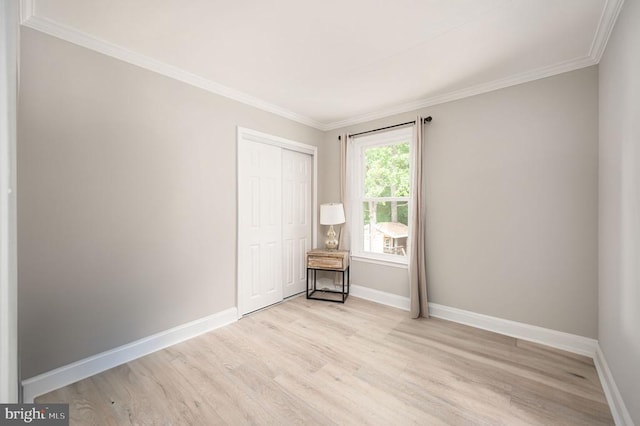 11603 Enchanted Woods Way, Fredericksburg, VA 22407 - spare room featuring light wood finished floors, crown molding, and baseboards