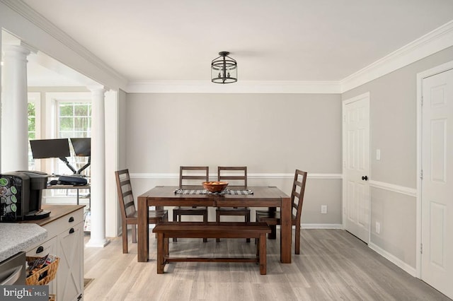 11603 Enchanted Woods Way, Fredericksburg, VA 22407 - dining room featuring ornate columns, light wood-style floors, ornamental molding, and baseboards