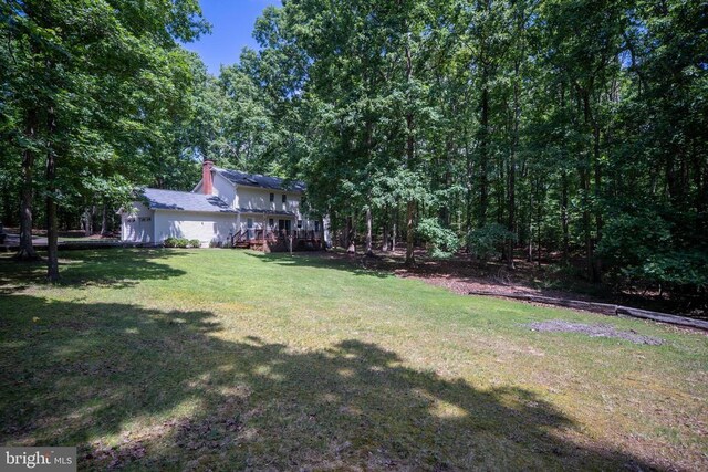 13403 Motts Run Rd, Fredericksburg, VA 22407 - view of grassy yard with a wooden deck