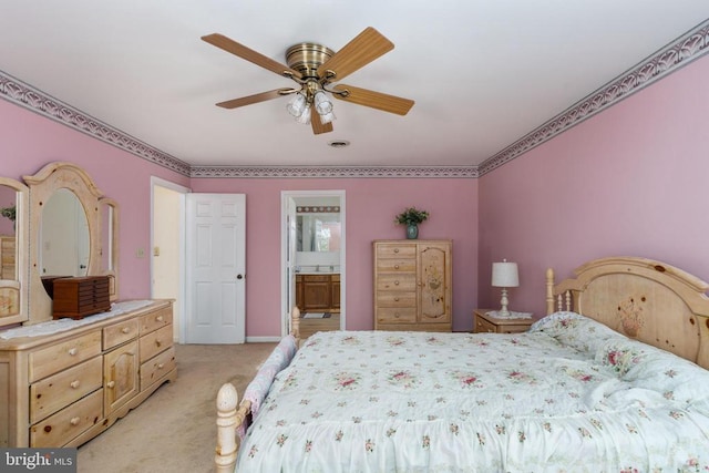 13403 Motts Run Rd, Fredericksburg, VA 22407 - bedroom with light carpet, connected bathroom, and ceiling fan