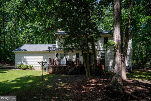 13403 Motts Run Rd, Fredericksburg, VA 22407 - rear view of house with a wooden deck, a yard, and a chimney
