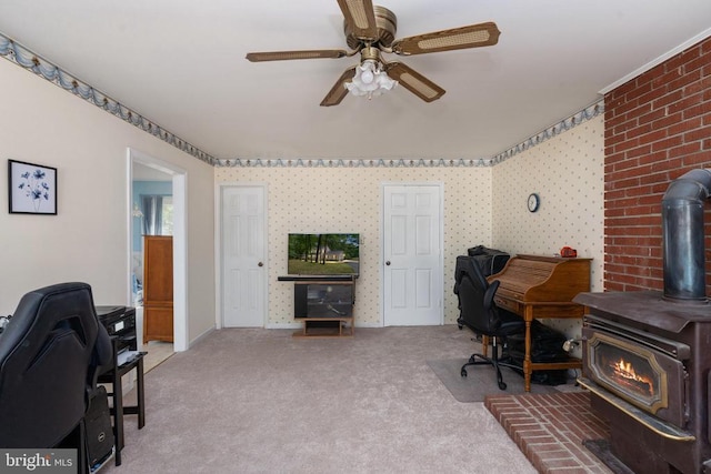 13403 Motts Run Rd, Fredericksburg, VA 22407 - office area featuring a wood stove, light colored carpet, and a ceiling fan