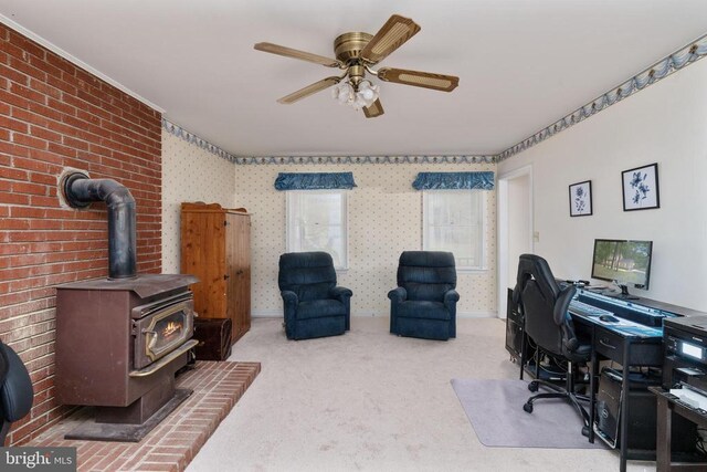 13403 Motts Run Rd, Fredericksburg, VA 22407 - office space featuring ceiling fan, a wood stove, and carpet floors
