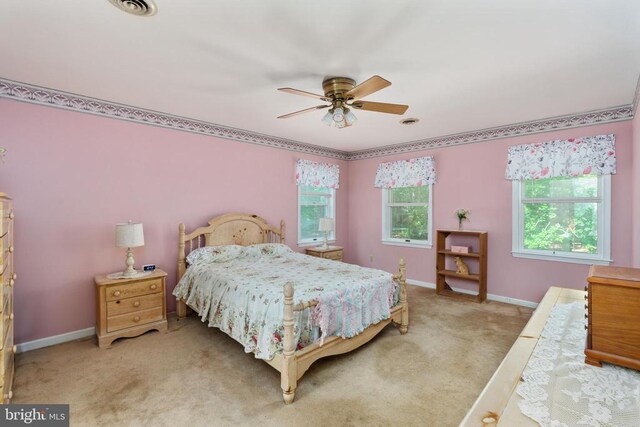 13403 Motts Run Rd, Fredericksburg, VA 22407 - bedroom featuring light colored carpet, baseboards, and a ceiling fan