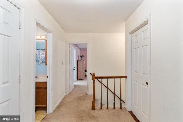 13403 Motts Run Rd, Fredericksburg, VA 22407 - corridor with an upstairs landing and light carpet