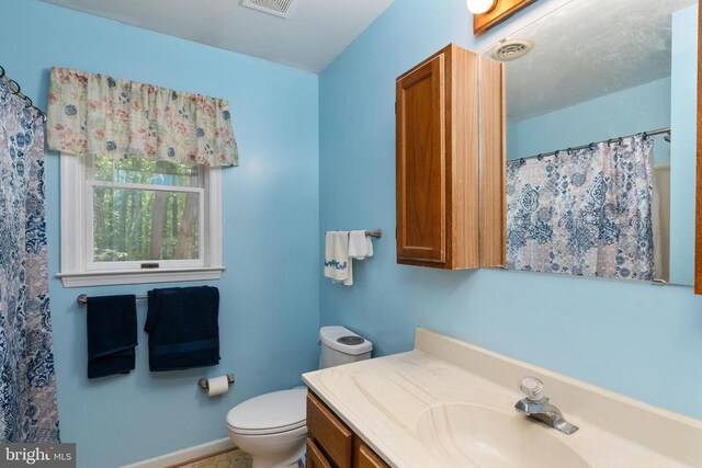13403 Motts Run Rd, Fredericksburg, VA 22407 - bathroom featuring vanity and toilet