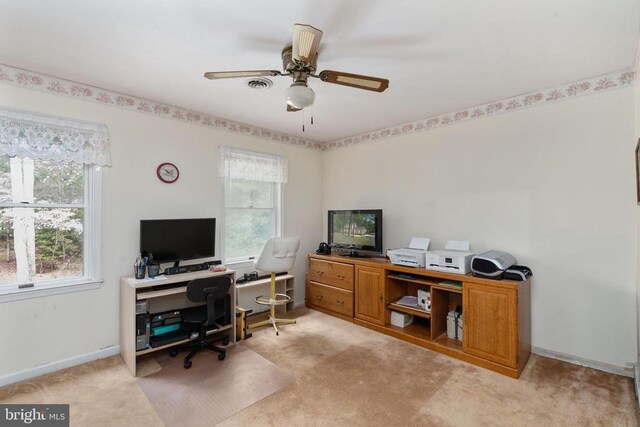 13403 Motts Run Rd, Fredericksburg, VA 22407 - home office with light colored carpet, a ceiling fan, and baseboards