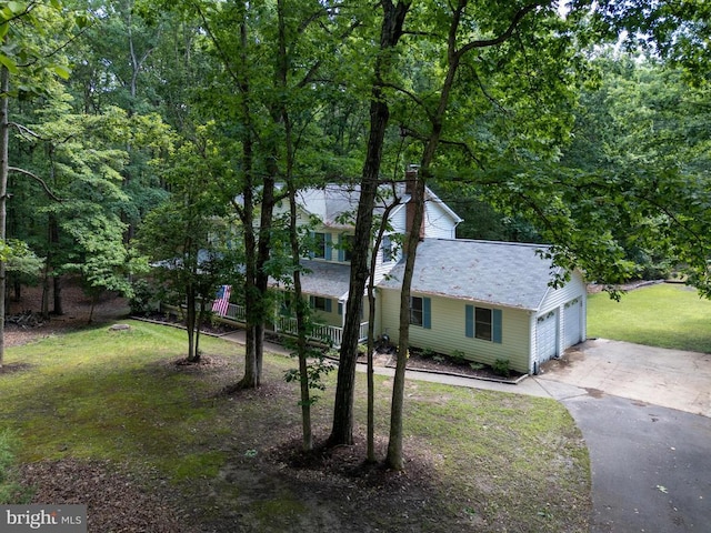 13403 Motts Run Rd, Fredericksburg, VA 22407 - view of front of home featuring driveway, a front yard, a chimney, and roof with shingles
