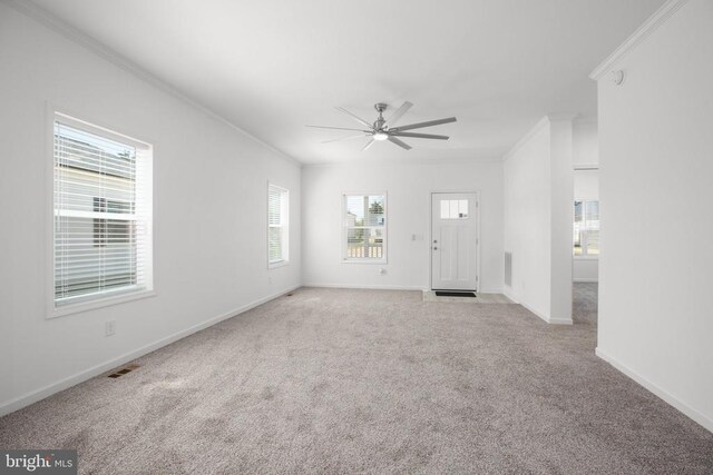 822 Mineral Ave, Mineral, VA 23117 - unfurnished living room featuring crown molding, ceiling fan, carpet flooring, and baseboards