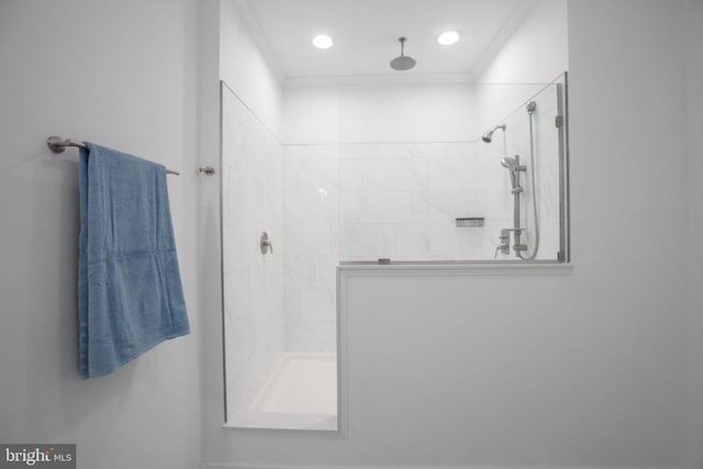 full bath featuring walk in shower and crown molding