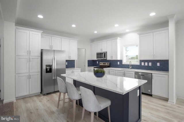 822 Mineral Ave, Mineral, VA 23117 - kitchen featuring stainless steel appliances, a sink, a center island, white cabinets, and recessed lighting