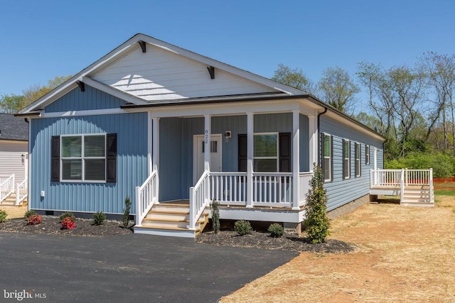 view of front of property with a porch and crawl space