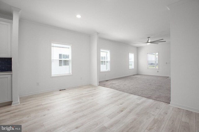 822 Mineral Ave, Mineral, VA 23117 - unfurnished living room featuring ornamental molding, ceiling fan, light wood-style floors, baseboards, and recessed lighting