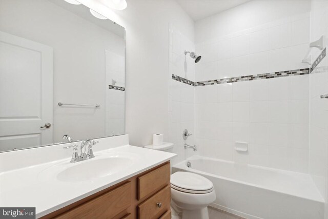full bath with toilet, tub / shower combination, and vanity