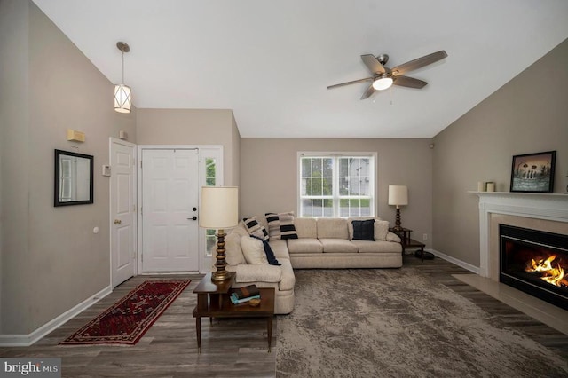 10118 New Scotland Dr, Fredericksburg, VA 22408 - living area with wood finished floors, a ceiling fan, baseboards, a fireplace with flush hearth, and high vaulted ceiling