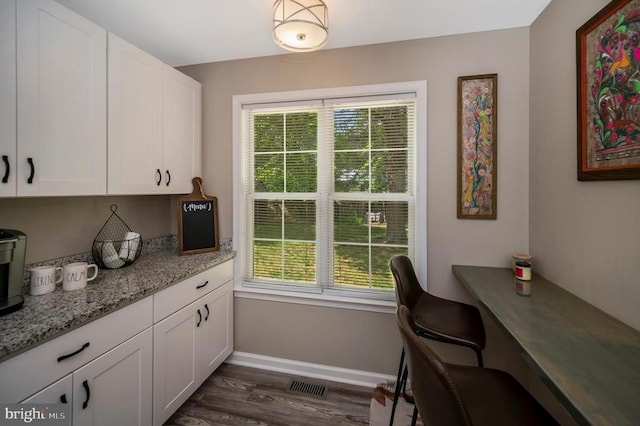 10118 New Scotland Dr, Fredericksburg, VA 22408 - office with baseboards and dark wood finished floors