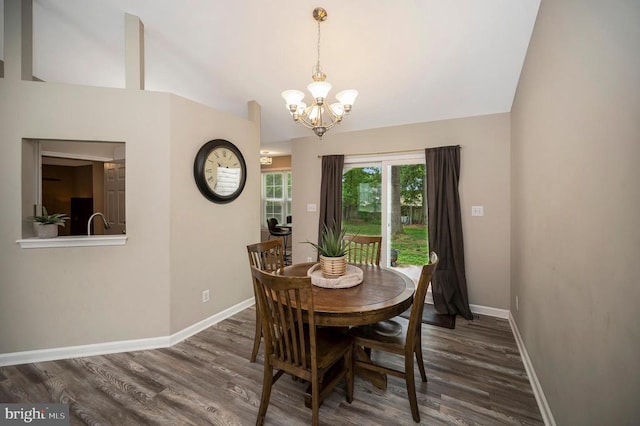 10118 New Scotland Dr, Fredericksburg, VA 22408 - dining room featuring a chandelier, baseboards, wood finished floors, and vaulted ceiling