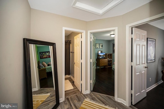 10118 New Scotland Dr, Fredericksburg, VA 22408 - corridor featuring dark wood-style flooring and baseboards