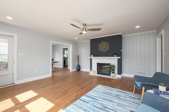 928 Baylor St, Staunton, VA 22401 - living room with ceiling fan, plenty of natural light, wood finished floors, a fireplace, and recessed lighting