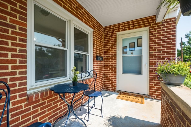 928 Baylor St, Staunton, VA 22401 - entrance to property featuring brick siding and a porch