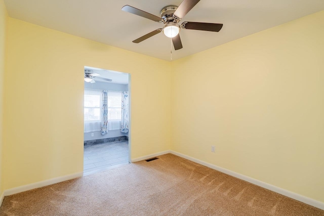 109 Jackson Ave, Elkton, VA 22827 - spare room with carpet flooring, ceiling fan, and baseboards