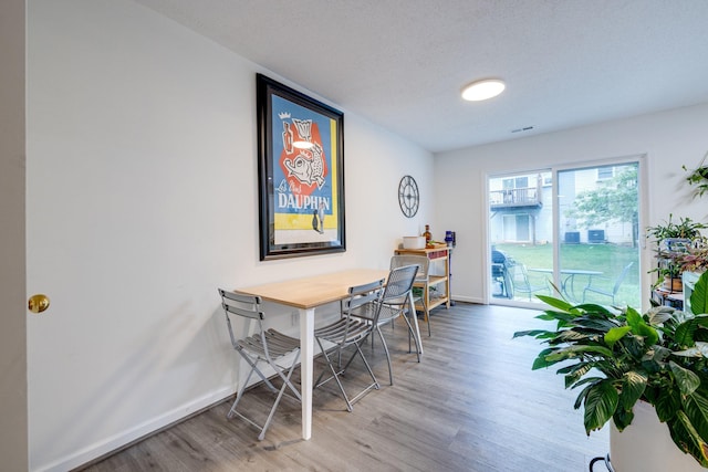 1045 Alexander Hamilton Ln, Harrisonburg, VA 22802 - dining room with wood finished floors and baseboards