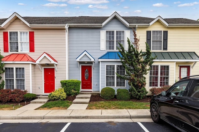 1045 Alexander Hamilton Ln, Harrisonburg, VA 22802 - townhome / multi-family property featuring a standing seam roof, metal roof, and uncovered parking