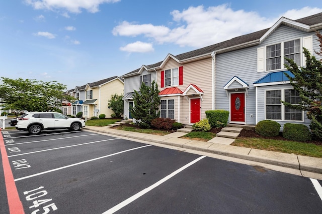 1045 Alexander Hamilton Ln, Harrisonburg, VA 22802 - view of property featuring a residential view, uncovered parking, a standing seam roof, and metal roof