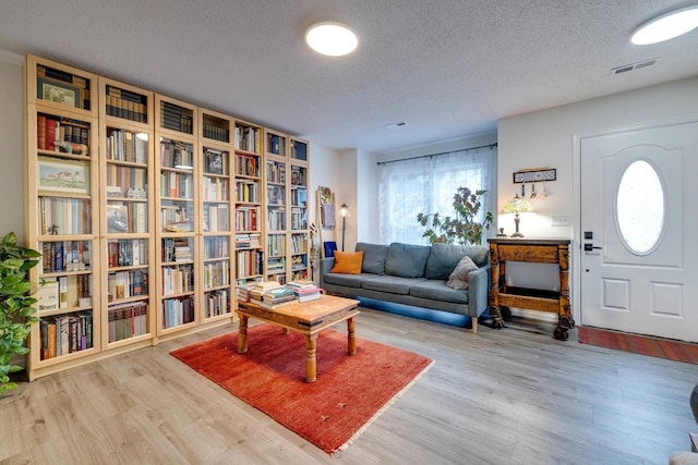 1045 Alexander Hamilton Ln, Harrisonburg, VA 22802 - living area with wood finished floors and a textured ceiling