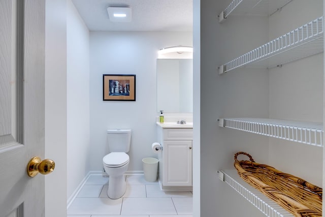1045 Alexander Hamilton Ln, Harrisonburg, VA 22802 - half bath with toilet, tile patterned flooring, vanity, and baseboards