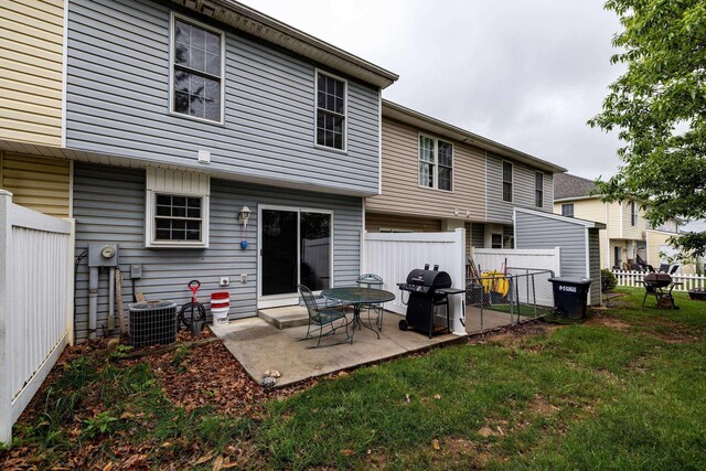 1045 Alexander Hamilton Ln, Harrisonburg, VA 22802 - back of property with a patio area and central air condition unit