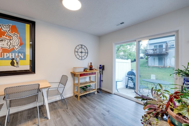 1045 Alexander Hamilton Ln, Harrisonburg, VA 22802 - home office featuring wood finished floors, baseboards, and a textured ceiling
