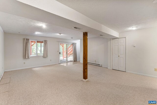 7 Englewood Dr, Palmyra, VA 22963 - below grade area with light carpet, visible vents, and a textured ceiling