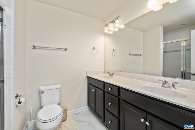 full bath featuring a stall shower, baseboards, marble finish floor, toilet, and a sink